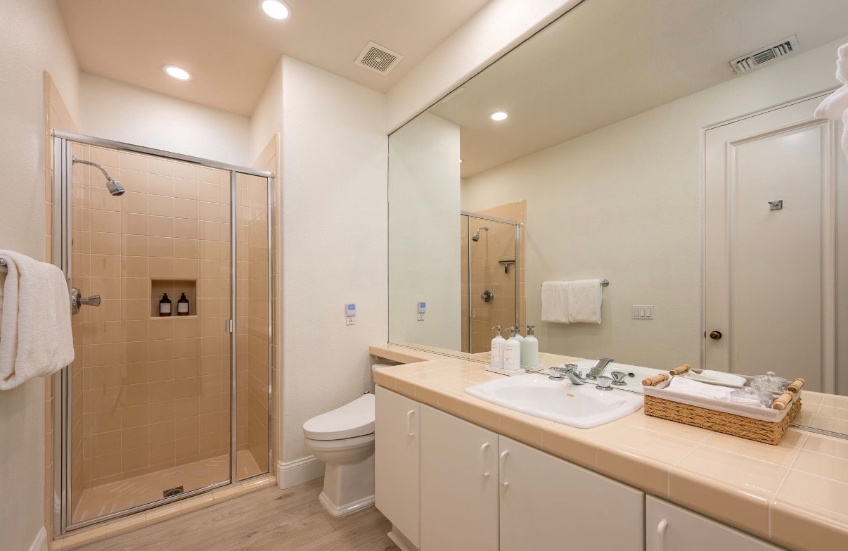 Private Casita bathroom at Solmirage with a walk-in shower and vanity.