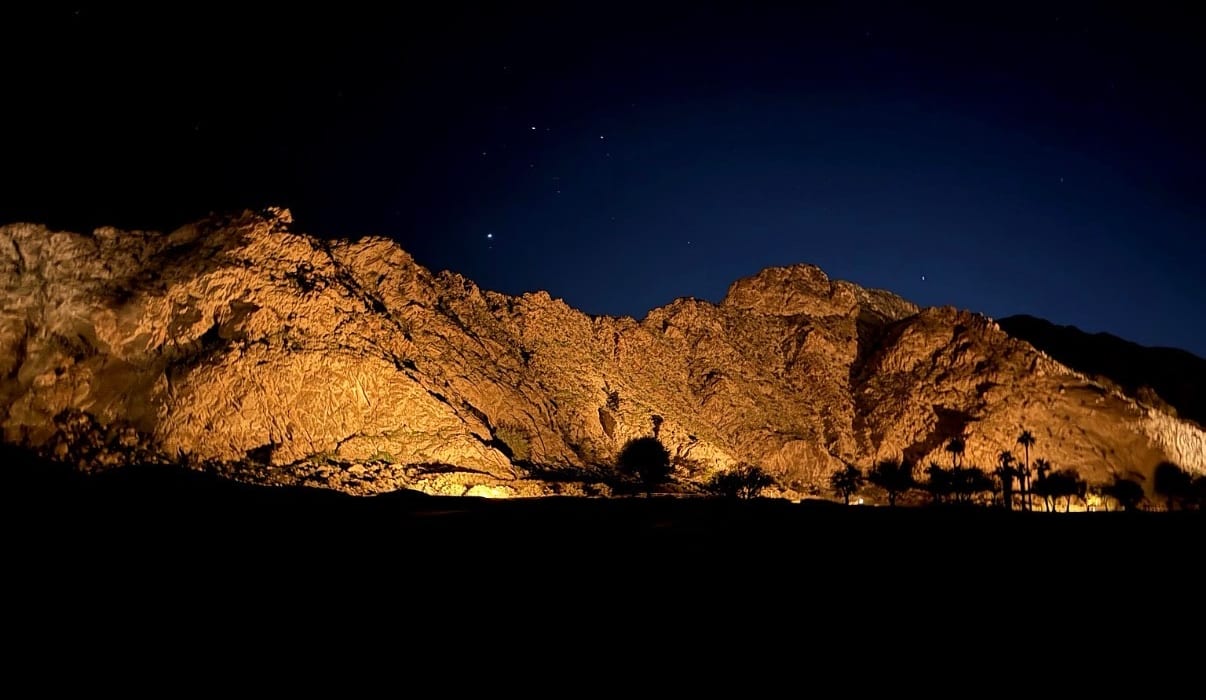 Illuminated Santa Rosa Mountains at night under a starlit sky, La Quinta